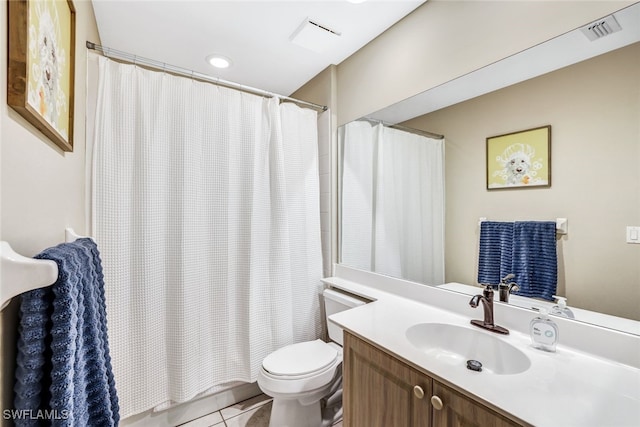 bathroom with curtained shower, tile patterned flooring, vanity, and toilet