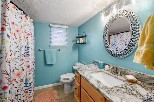 bathroom with a textured ceiling, a shower with curtain, tile patterned floors, vanity, and toilet