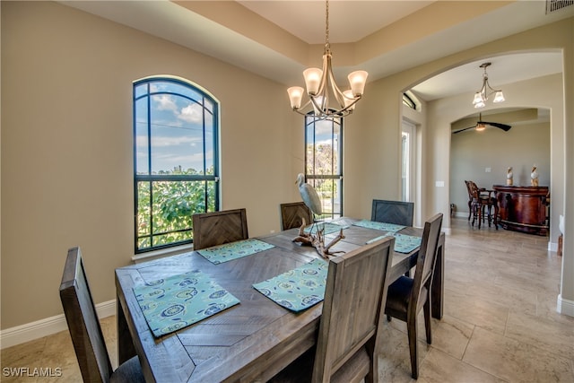 dining area with a notable chandelier and plenty of natural light