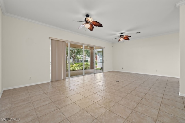 tiled spare room featuring ceiling fan and ornamental molding