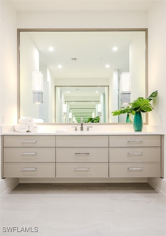 bathroom with vanity and tile patterned floors