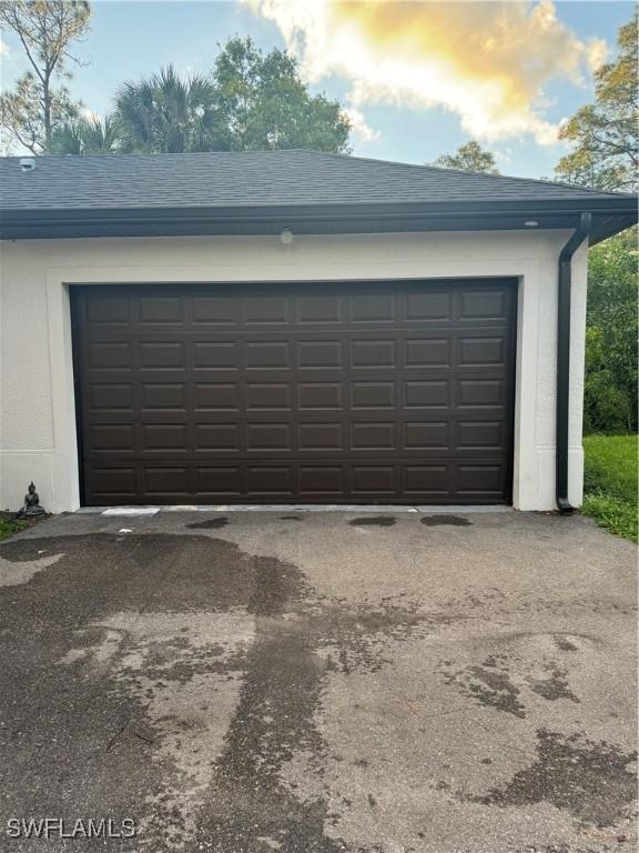 garage with driveway