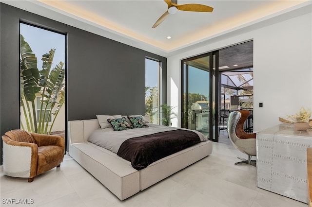 bedroom featuring access to outside and ceiling fan