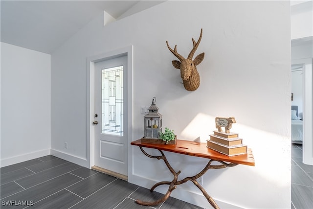 foyer with vaulted ceiling