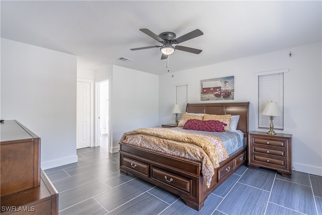 bedroom featuring ceiling fan and dark hardwood / wood-style floors