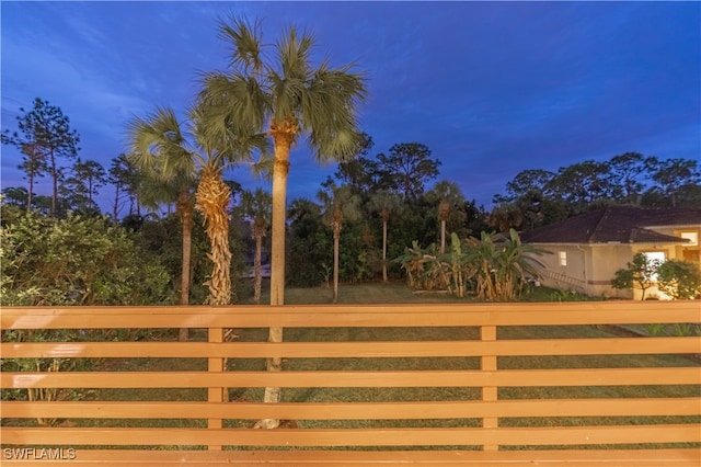 view of gate at dusk