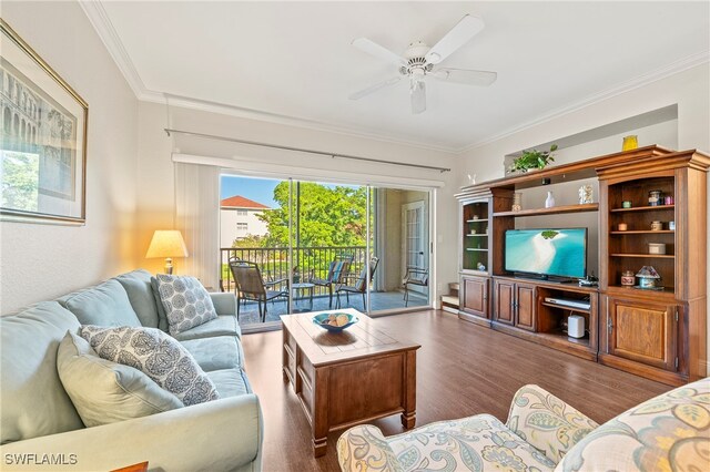 living room featuring ornamental molding, dark hardwood / wood-style floors, and ceiling fan