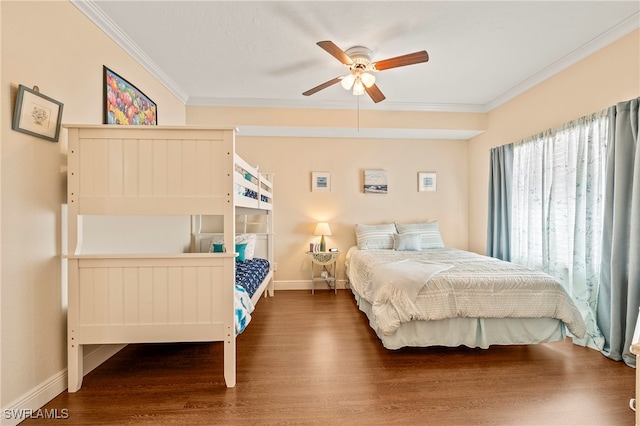 bedroom with ornamental molding, wood-type flooring, and ceiling fan