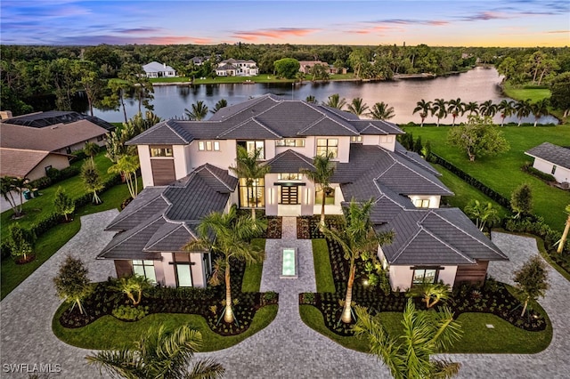 796 Cassena Rd, Naples, FL 34108 - aerial view at dusk of a water view