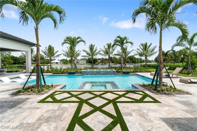 view of pool with an in ground hot tub and a patio