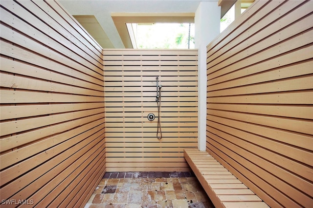 view of sauna / steam room with wooden walls