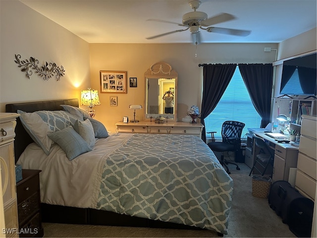 carpeted bedroom featuring ceiling fan