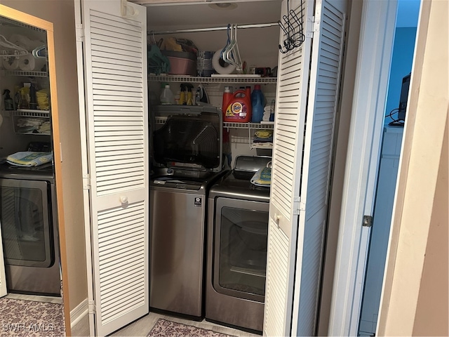 laundry room with washer and clothes dryer