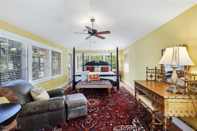 bedroom with lofted ceiling and ceiling fan