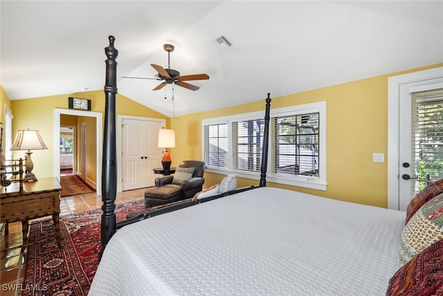 bedroom with lofted ceiling, ceiling fan, access to exterior, and tile patterned floors