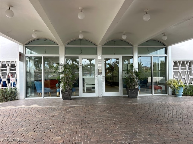 property entrance featuring french doors