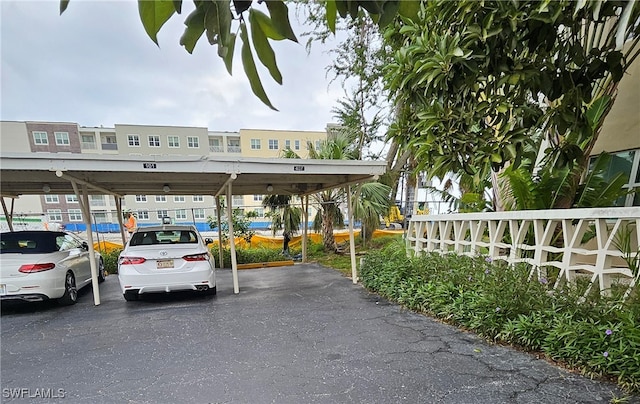 view of car parking featuring a carport