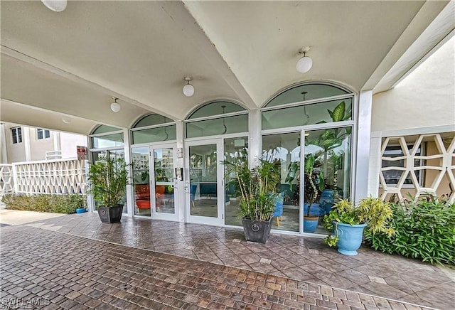 interior space with french doors and a patio area