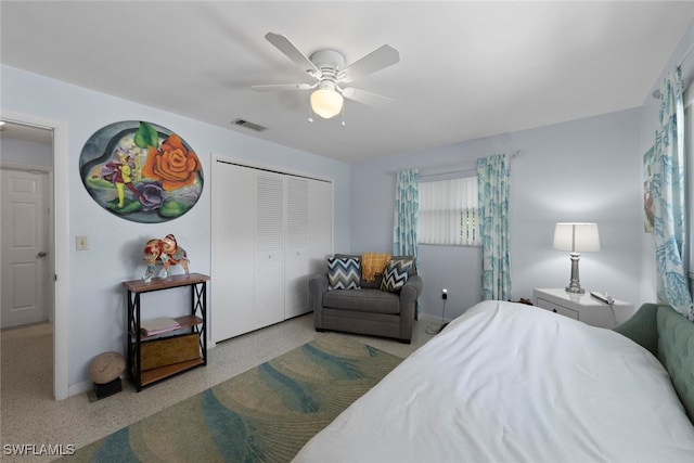 bedroom with a closet and ceiling fan