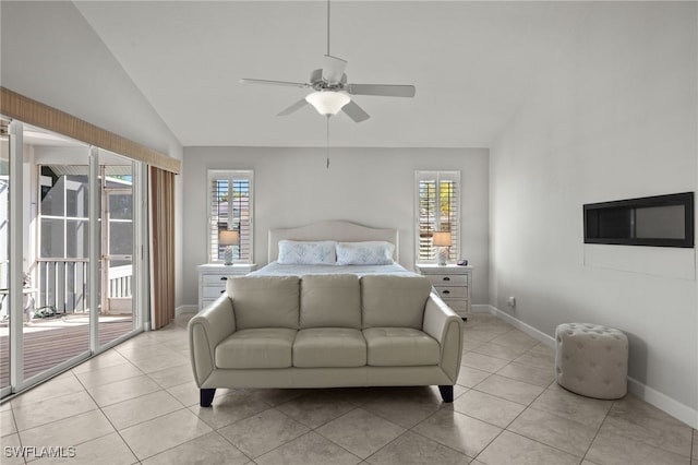 tiled bedroom featuring ceiling fan, access to outside, and vaulted ceiling