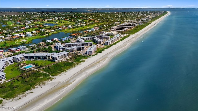 bird's eye view with a view of the beach and a water view