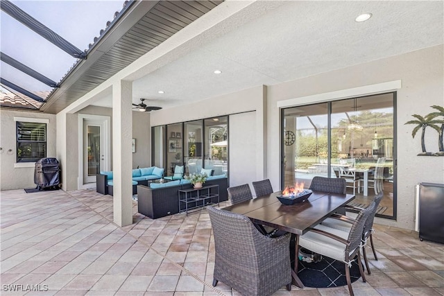 view of patio featuring an outdoor living space and ceiling fan