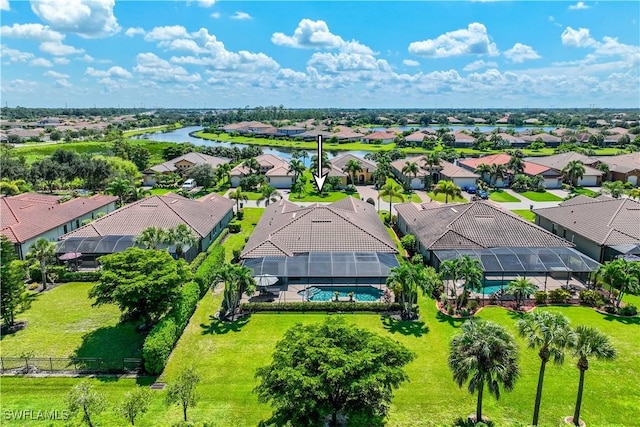 drone / aerial view with a water view