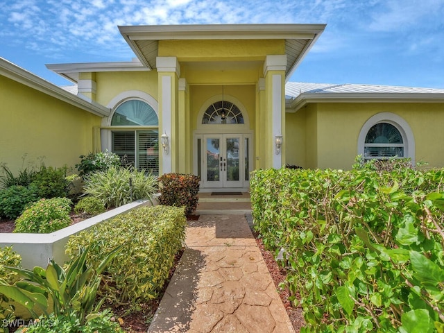 entrance to property featuring french doors