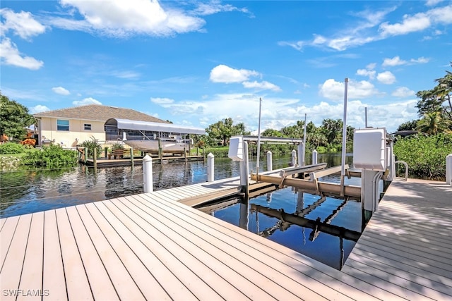 view of dock with a water view