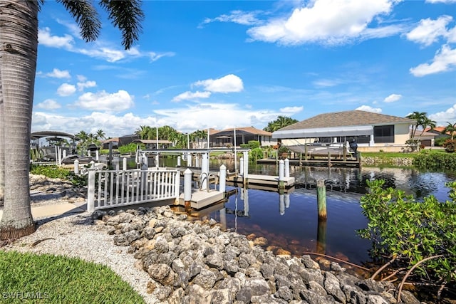 dock area with a water view