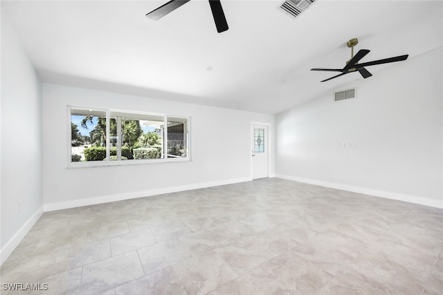 spare room with vaulted ceiling and ceiling fan