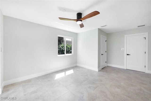 spare room featuring ceiling fan