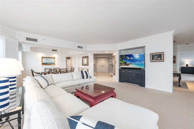 living room featuring ornamental molding and light colored carpet