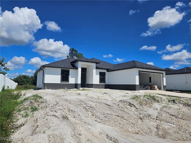 view of front of property featuring a garage