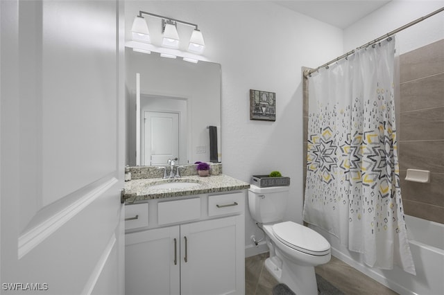 full bathroom with vanity, toilet, and shower / bath combo with shower curtain