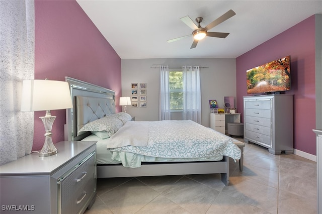 bedroom featuring ceiling fan and light tile patterned floors