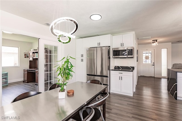 dining area featuring dark hardwood / wood-style flooring