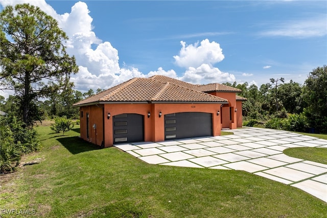 garage with a lawn