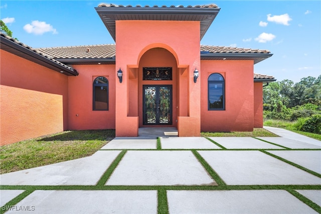 property entrance with french doors