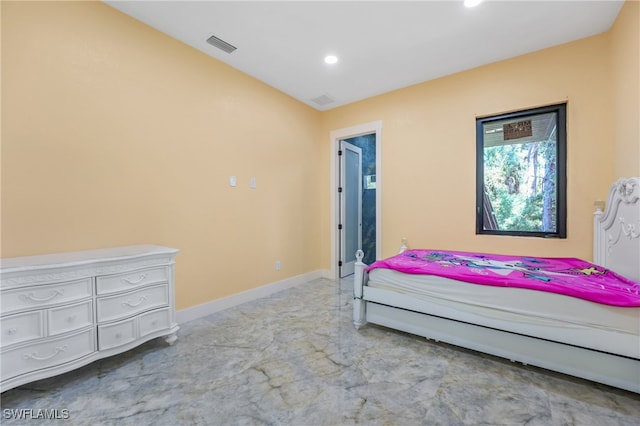 bedroom featuring vaulted ceiling