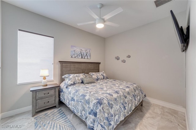 bedroom with marble finish floor, baseboards, visible vents, and ceiling fan