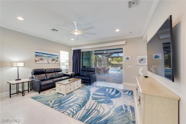 living area with light tile patterned floors, visible vents, baseboards, ceiling fan, and crown molding