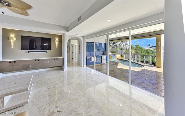 interior space with crown molding