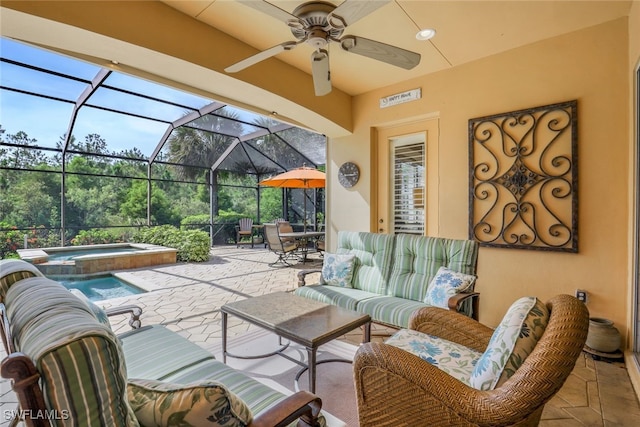 view of patio featuring an outdoor living space, glass enclosure, ceiling fan, and a pool with hot tub