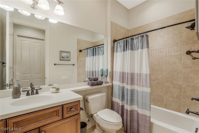 full bathroom featuring shower / bath combo with shower curtain, vanity, and toilet