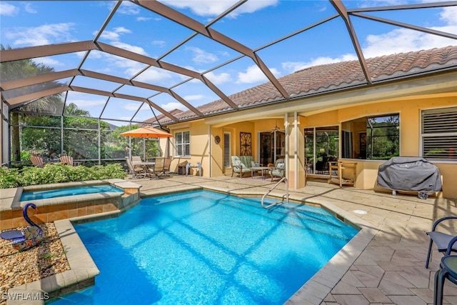 view of pool with glass enclosure, ceiling fan, grilling area, an in ground hot tub, and a patio