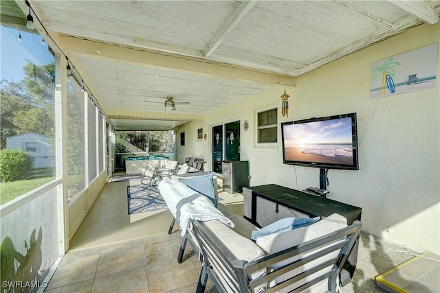 sunroom / solarium with beamed ceiling