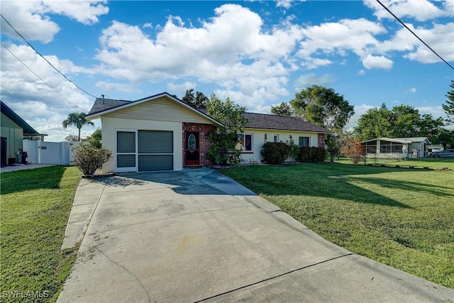 single story home with a front yard and a garage