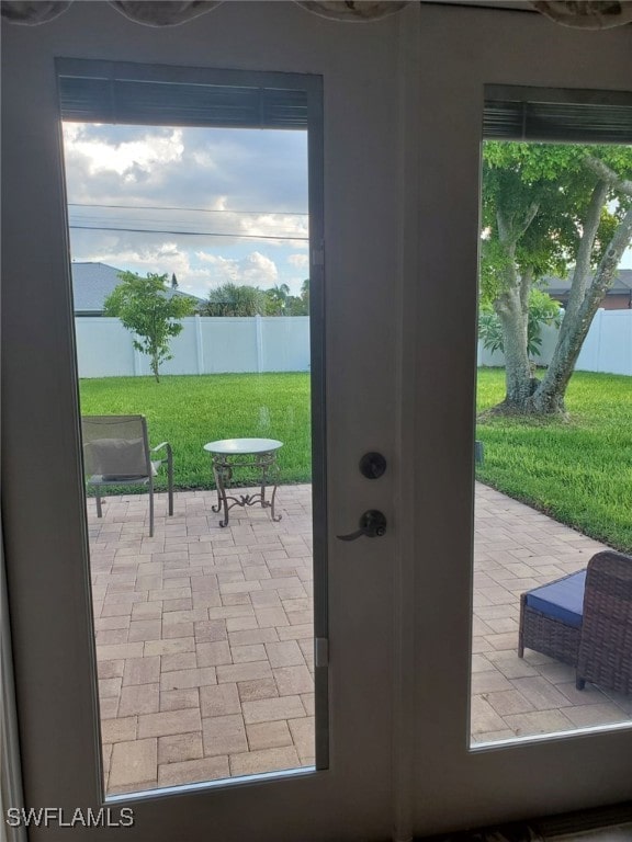 doorway to outside featuring a wealth of natural light