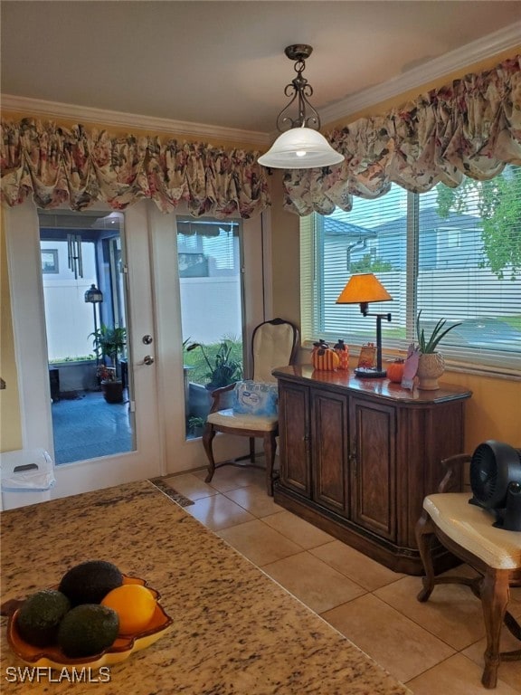 office with light tile patterned flooring and ornamental molding